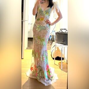 Brand new. With tag. Never worn. Retails for $8000+.